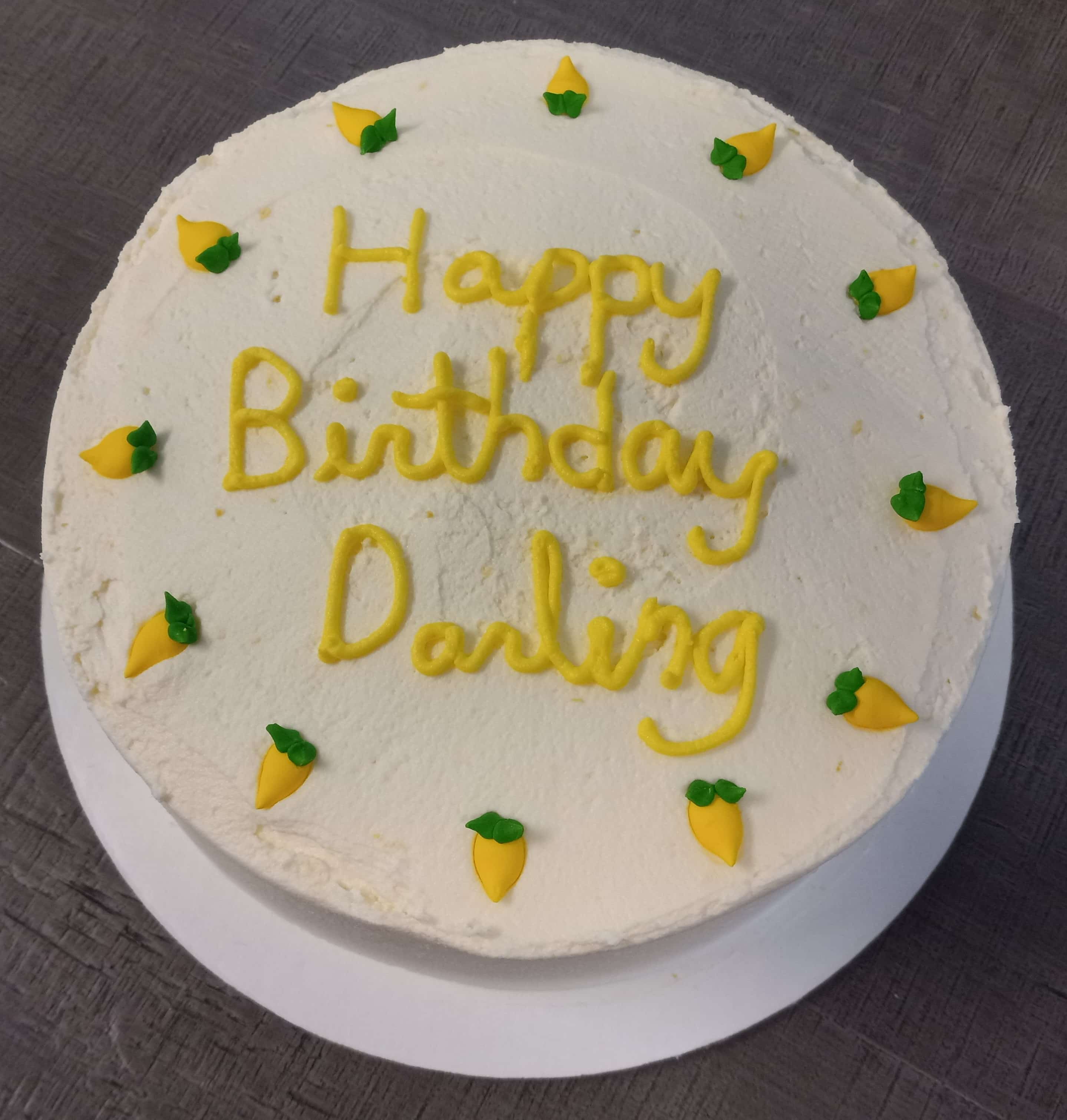 gluten free lemon cream cheese frosting on yellow cake